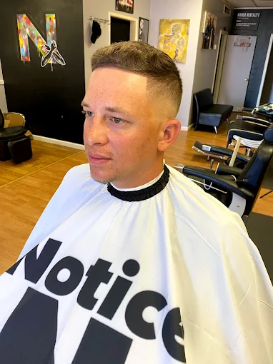 Clean fade with Notice cape